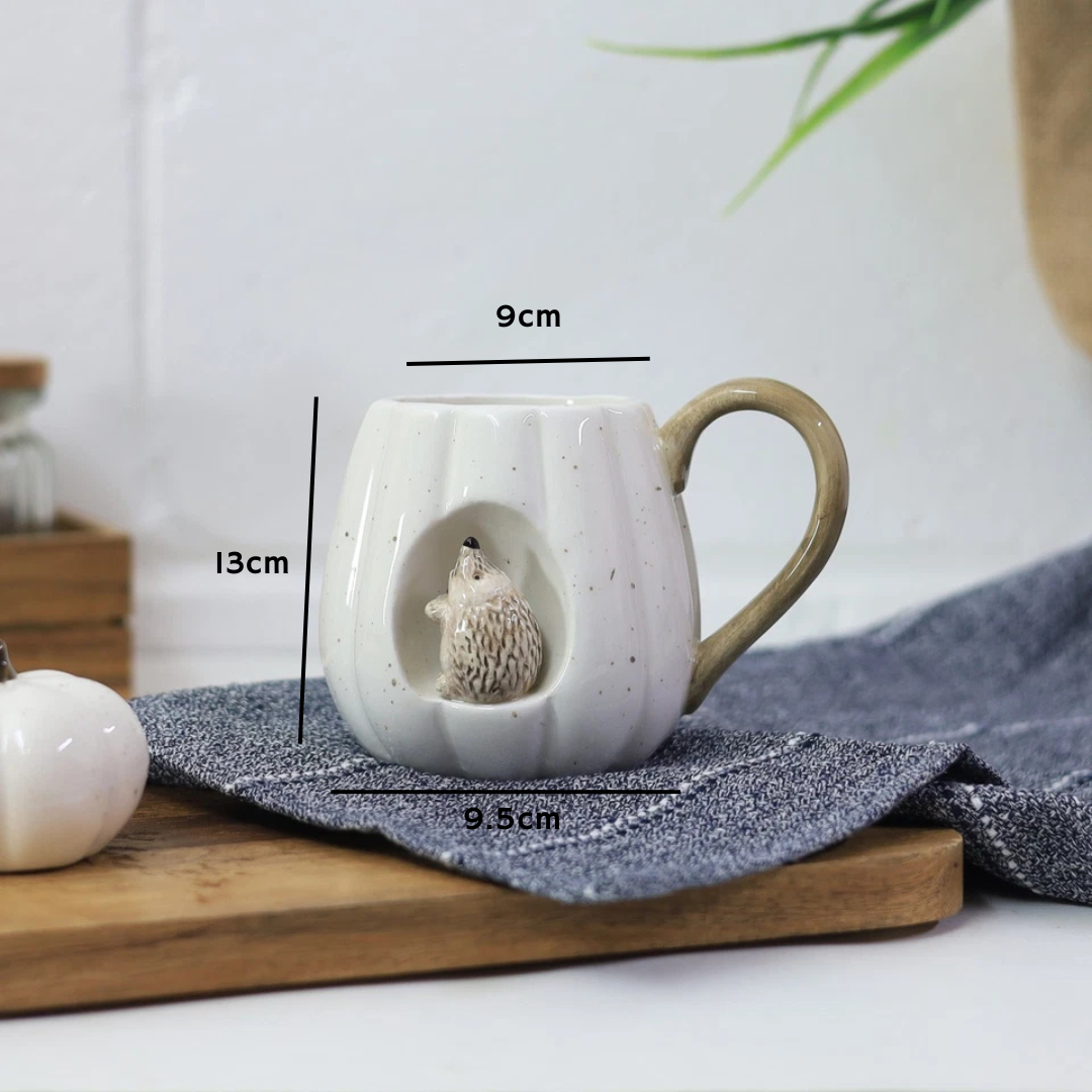 Spindle™ | Hedgehog & Pumpkin Ceramic Mug – Rustic Autumn Coffee & Tea Cup